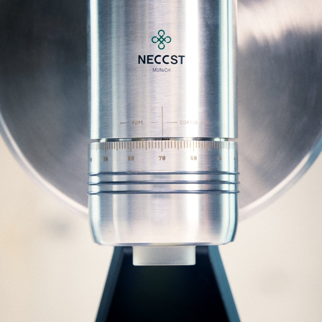 Patented stepless grind adjustment dial on the NECCST Series 1